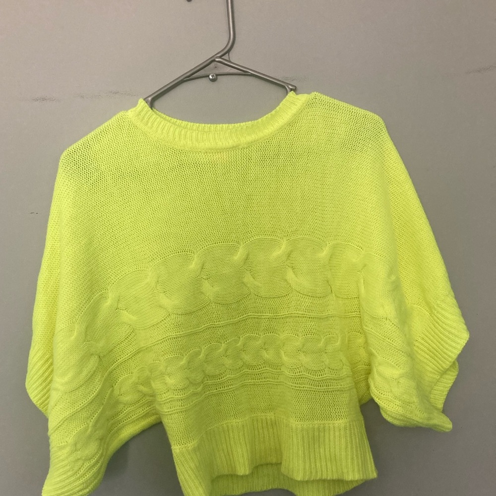 Electric yellow sweater.